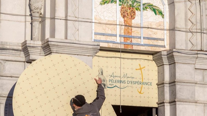 The mosaics on the doors of the facade of the Basilica of Our Lady of the Rosary, at the Sanctuary of Our Lady of Lourdes in southwestern France, are being covered in an undated photograph provided by the sanctuary. The doors showcase the artwork of Father Marko Rupnik, a priest and former Jesuit who is currently under investigation for alleged abuse of multiple women. On March 31, 2025, Bishop Jean-Marc Micas of Lourdes and Tarbes said the sanctuary would cover the mosaics on the doors to make the basilica more welcoming for all, particularly victims of abuse. (OSV News photo/courtesy Lourdes Sanctuary)
