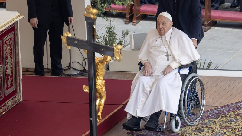Pope Francis is brought on stage in St. Peter's Square in a wheelchair at the end of Palm Sunday Mass at the Vatican April 13, 2025. (CNS photo/Lola Gomez)