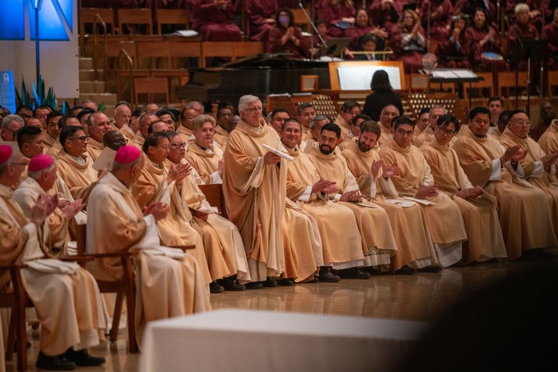 Father Vito DiMarzio is recognized as one of the priests celebrating jubilarian anniversaries of 50 years in the priesthood during the Chrism Mass at the Cathedral of Our Lady of the Angels on April 14. (John Rueda)