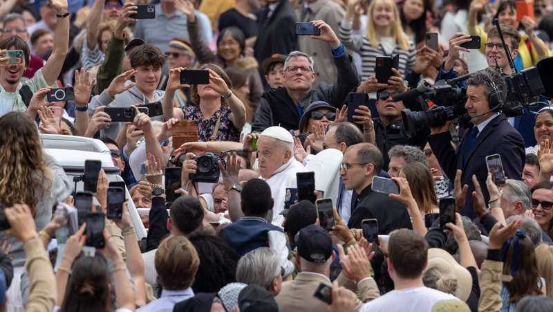Pope Francis, in the popemobile, greets people in St. Peter's Square at the Vatican after giving his Easter blessing April 20, 2025. (CNS/Pablo Esparza)