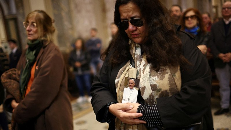 Women pray inside Buenos Aires' Metropolitan Cathedral in Buenos Aires, Argentina, April 21, 2025, after the death of Pope Francis was announced by the Vatican. Pope Francis, formerly Argentine Cardinal Jorge Mario Bergoglio, died April 21 at age 88. (OSV News photo/Agustin Marcarian, Reuters)