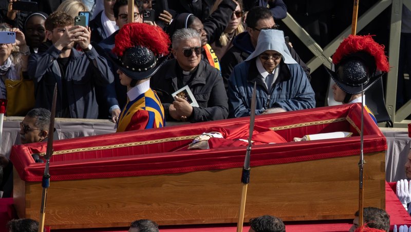 Pallbearers carry the body of Pope Francis in his casket through St. Peter's Square on their way into St. Peter's Basilica at the Vatican April 23, 2025, as the pope's mortal remains are prepared for public viewing and prayer. (CNS photo/Pablo Esparza)