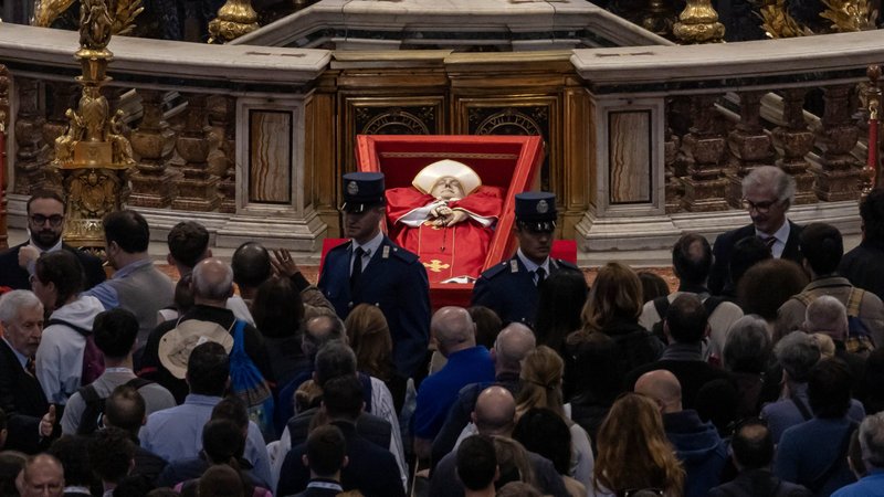 People gather inside St. Peter’s Basilica at the Vatican April 25, 2025, to view the body of Pope Francis on the last day of public visitation. The pope's funeral Mass was scheduled for April 26. (CNS photo/Pablo Esparza)
