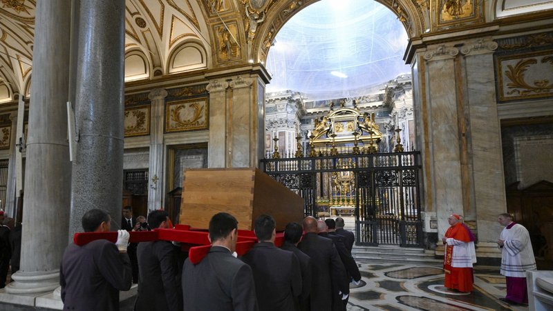 Fourteen pallbearers carry Pope Francis' casket by the Pauline Chapel in Rome's Basilica of St. Mary Major to its final resting place April 26, 2025. (CNS/Vatican Media)