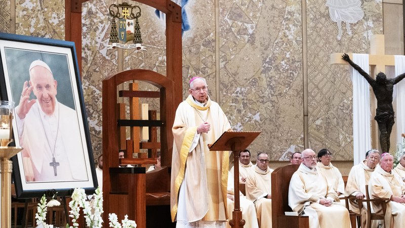 Archbishop José H. Gomez delivers his homily next to a portrait of Pope Francis during a memorial Mass for the deceased pontiff on April 25. (Victor Alemán)