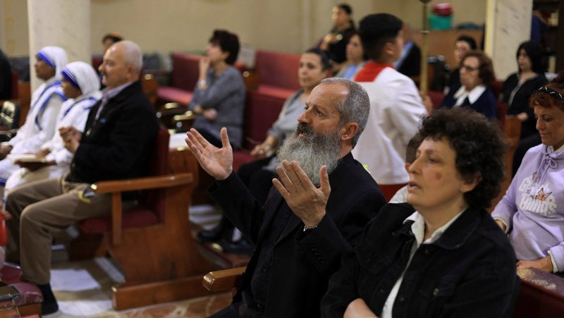 Palestinian Christians attend a Mass at Holy Family Church in Gaza City, April 21, after the death of Pope Francis was announced by the Vatican. (OSV News/Dawoud Abu Alkas, Reuters)