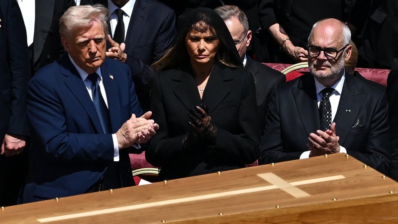 U.S President Donald Trump and first lady Melania Trump look at the casket of Pope Francis during his funeral Mass in St. Peter's Square at the Vatican April 26, 2025. (OSV News photo/Dylan Martinez, Reuters)
