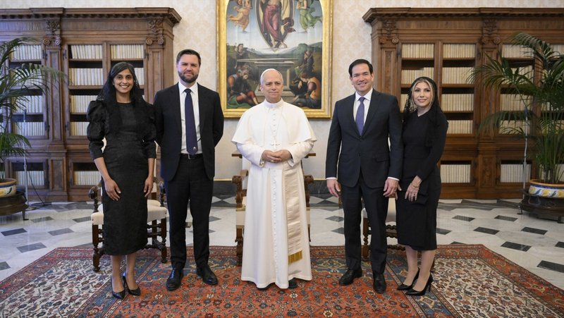 Pope Leo XIV poses for a photograph with U.S. Vice President JD Vance and his wife, Usha Vance, and U.S. Secretary of State Marco Rubio and his wife, Jeanette Dousdebes Rubio, in the library of the Apostolic Palace at the Vatican May 19, 2025. (CNS photo/Vatican Media)