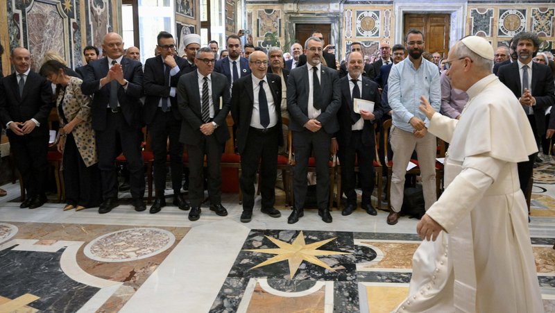 Pope Leo XIV greets members of grassroots groups and Catholic associations that work for peace and justice during an audience at the Vatican May 30, 2025. (CNS photo/Vatican Media)