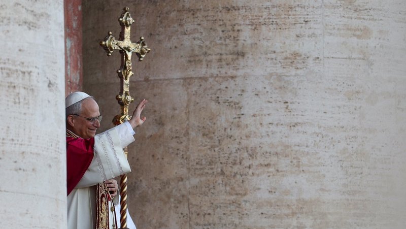 Pope Leo XIV waves to the crowd on the central balcony of St. Peter’s Basilica at the Vatican May 8, following his election during the conclave. (OSV News photo/Stoyan Nenov, Reuters)