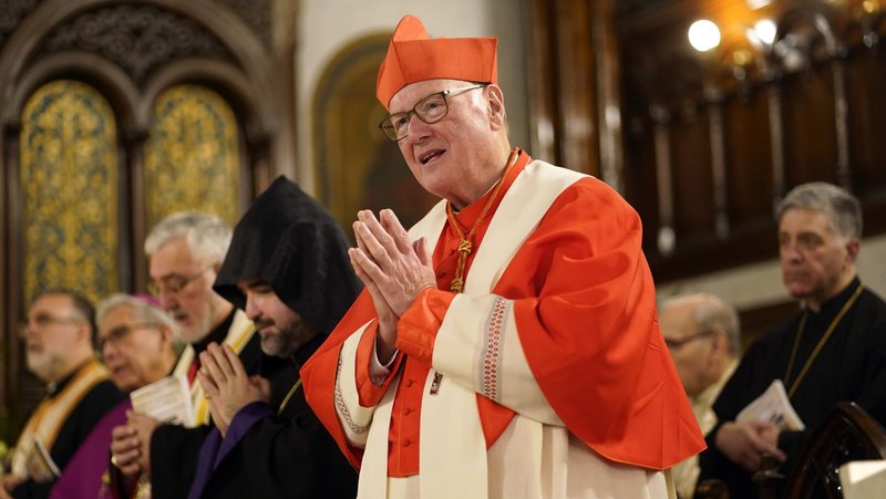 New York Cardinal Timothy M. Dolan joins the assembly in reciting the Nicene Creed during an ecumenical prayer service for peace in the world in honor of Mary, Mother of God, at Our Lady of Lebanon Maronite Cathedral in the Brooklyn Heights section of Brooklyn, N.Y., May 20, 2025. In a May 29 Wall Street Journal commentary, Cardinal Dolan said he is "stunned" that New York lawmakers "are on the verge of legalizing suicide," and he said he prays the governor "will step up to protect precious human life." (OSV News photo/Gregory A. Shemitz)