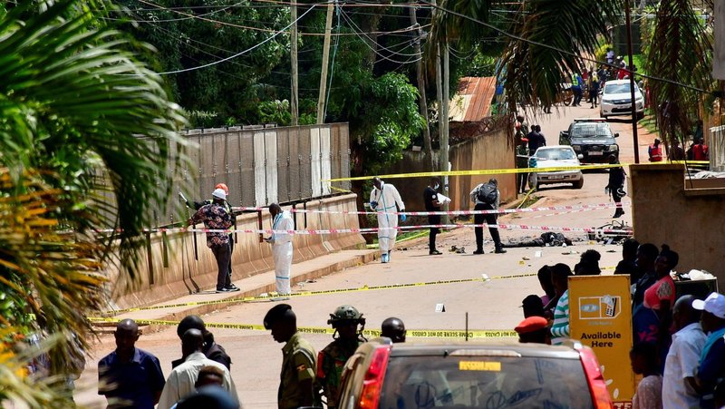 Forensic experts secure the scene of a bomb blast near the Munyonyo Martyrs' Catholic Shrine in the Munyonyo suburb of Kampala, Uganda June 3, 2025, as Ugandans assembled to celebrate Martyrs' Day, which commemorates Christians who were killed for their faith in the 19th century. The explosion killed two suspected rebels, including a female suicide bomber in Uganda's capital, but no other people were reported hurt, authorities said. (OSV News photo/Abubaker Lubowa, Reuters) EDITORS: NOTE GRAPHIC CONTENT.