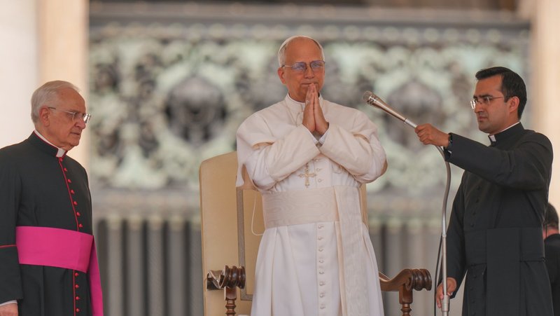 Pope Leo XIV prays as he begins his weekly general audience in St. Peter's Square at the Vatican June 11, 2025. (CNS photo/Lola Gomez)