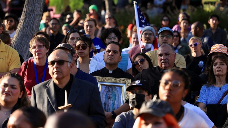 A member of the clergy holding an image of Our Lady of Guadalupe attends a vigil in Grand Park in downtown Los Angeles June 10, 2025, as protests against federal immigration sweeps continue. (OSV News photo/David Swanson, Reuters)