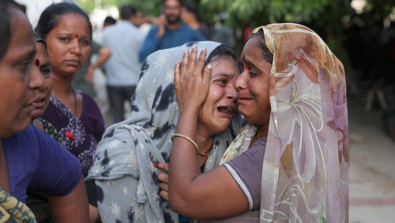 A family member cries upon hearing the news of her brother who died when the Air India Boeing 787 Dreamliner plane crashed in Ahmedabad, India, June 12, 2025. The flight crashed midday shortly after takeoff from Ahmedabad airport with more than 240 people on board. (OSV News photo/Amit Dave, Reuters)
