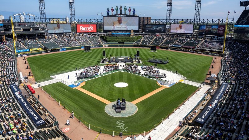 People gather ahead of a June 14, 2025, Mass in honor of Pope Leo XIV at Rate Field in Chicago, home of the Chicago White Sox baseball team. The Chicago-born pontiff, elected May 8, is the first American-born pope in history. (OSV News photo/Carlos Osorio, Reuters)