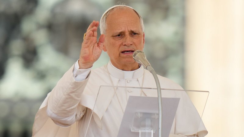 Pope Leo XIV gives his blessing after praying the Angelus in St. Peter’s Square at the Vatican June 15, 2025. (CNS photo/Lola Gomez)