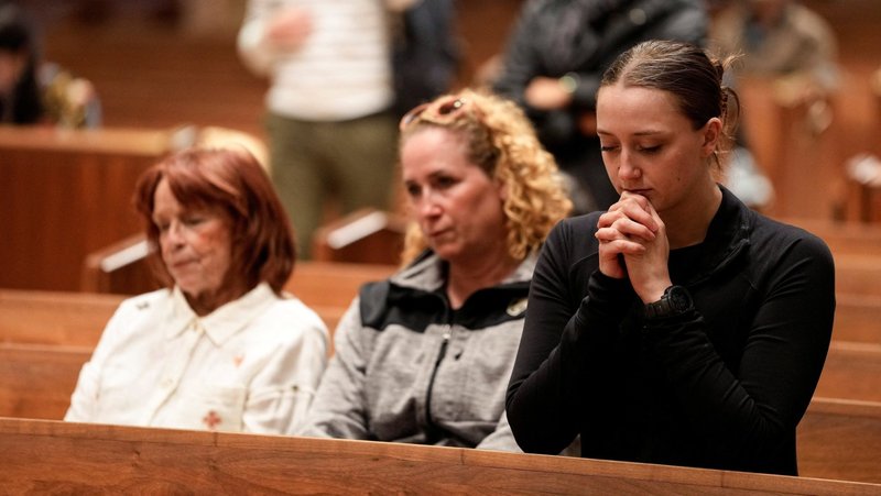 A young woman prays at Holy Name Cathedral in Chicago May 8, 2025. The Pew Research Center released a June 16, 2025, analysis of U.S. Catholic life. (OSV News photo/Vincent Alban, Reuters)