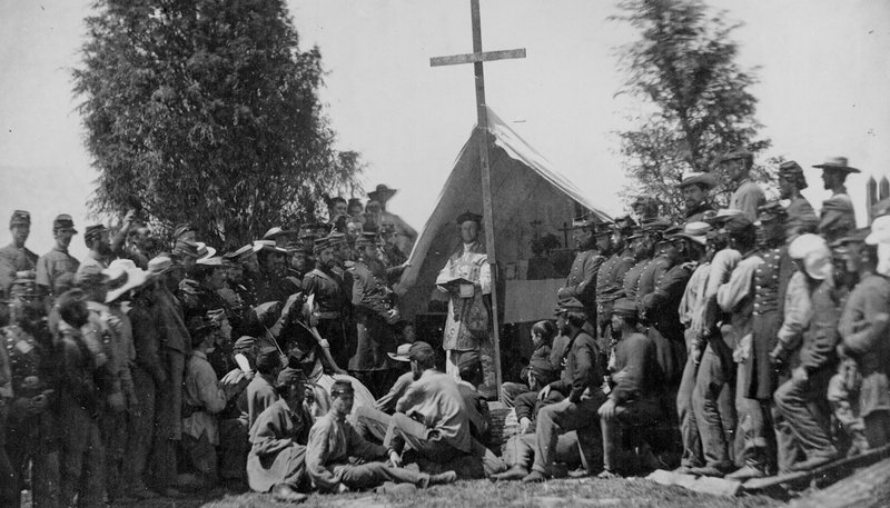Father Thomas Mooney conducting Mass for the 69th New York State Militia encamped at Fort Corcoran, Washington, D.C., June 1, 1861. (Mathew B. Brady/Courtesy Library of Congress/Public Domain via Wikimedia Commons)