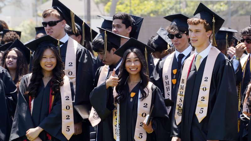 A graduate gives a thumbs up after receiving her diploma during Bishop Montgomery High School’s graduation ceremony on May 30. (Bishop Montgomery High School)