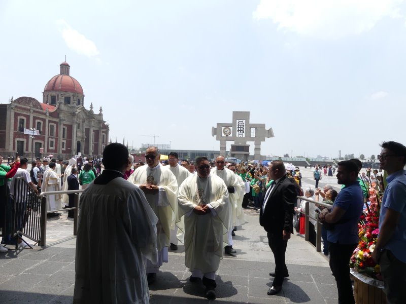 Priests and LA Catholics walk into the Basilica of Our Lady of Guadalupe in Mexico City for a special Mass during the archdiocese's annual pilgrimage to Mexico on July 4. (Submitted photo/Archdiocese of Los Angeles)