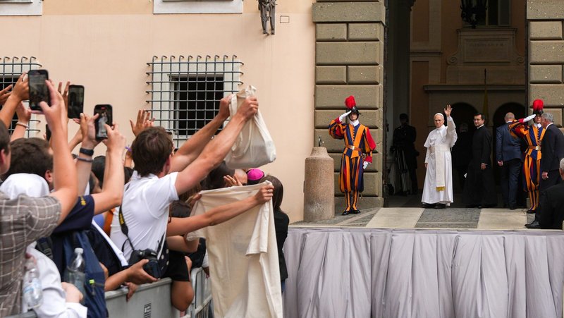 Pope Leo XIV greets visitors as he departs following his first Angelus prayer in Castel Gandolfo, Italy, July 13, 2025. (CNS photo/Lola Gomez)