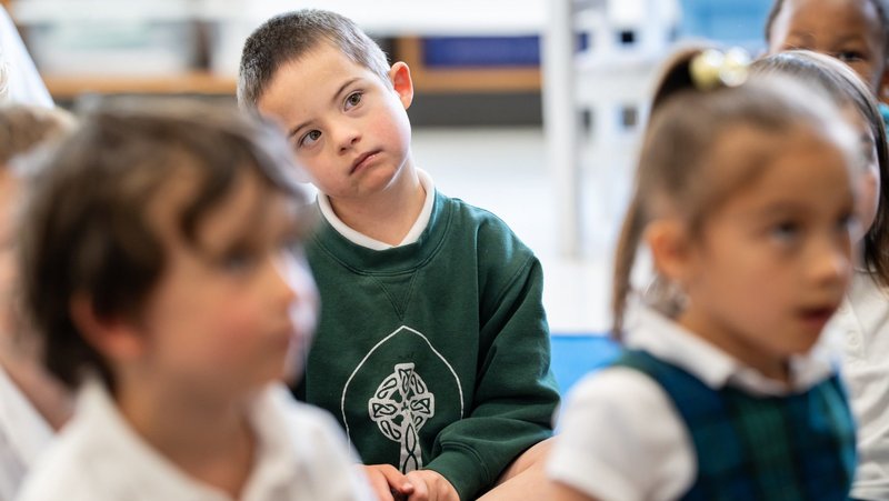Aloysius Ford, who has Down syndrome, sits with classmates while listening to his kindergarten teacher during class at St. Patrick Catholic School in Tacoma, Wash., May 21, 2025. (OSV News photo/Stephen Brashear)