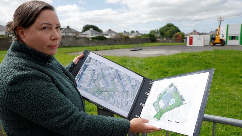 Senior forensic consultant Niamh McCullagh holds a map July 7, 2025, showing the planned excavation of the graveyard in Tuam, Ireland, where the bodies of 796 babies were uncovered at the site of a former mother-and-baby home run on behalf of the Irish government by the Catholic Sisters of Bon Secours. (OSV News/Clodagh Kilcoyne, Reuters)