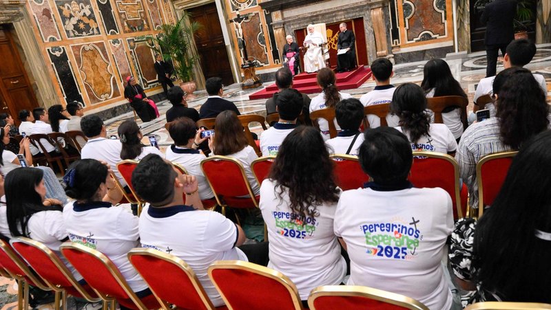 Pope Leo XIV meets with a group of young people from Peru at the Vatican July 28, 2025, as the Jubilee of Youth kicks off in Rome. (CNS photo/Vatican Media)