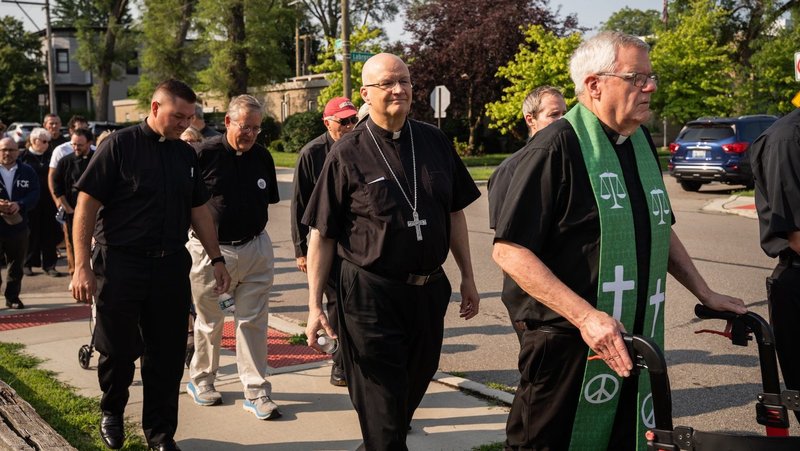 Detroit Archbishop Edward J. Weisenburger joins other clergy during a procession from Most Holy Trinity Church in Detroit's Corktown neighborhood to the ICE Regional Field Office on Michigan Avenue in downtown Detroit July 14, 2025. The procession was organized by Strangers No Longer, a Catholic grassroots immigrant rights advocacy group. (OSV News photo/Valaurian Waller, Detroit Catholic)
