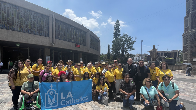Archbishop José H. Gomez poses with pilgrims outside the Basilica of Our Lady of Guadalupe in Mexico City during LA Catholics’ annual pilgrimage to Mexico on July 4. (Submitted photo/Archdiocese of Los Angeles)