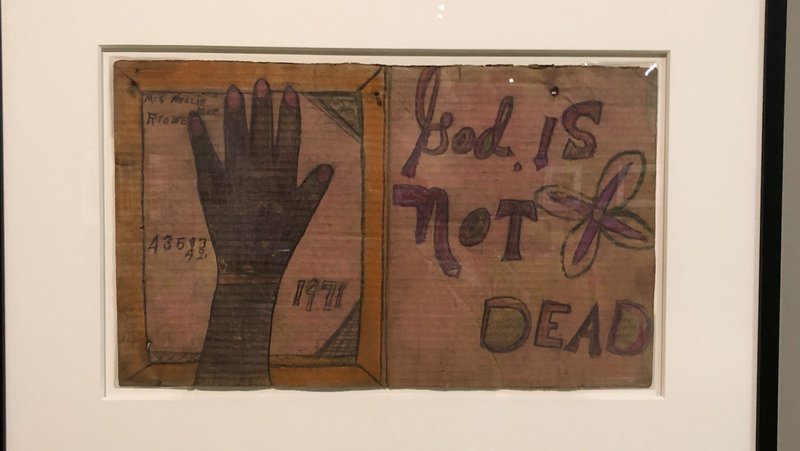 A picture of “God is not Dead,” by Nellie Mae Rowe, 1971. (Heather King)