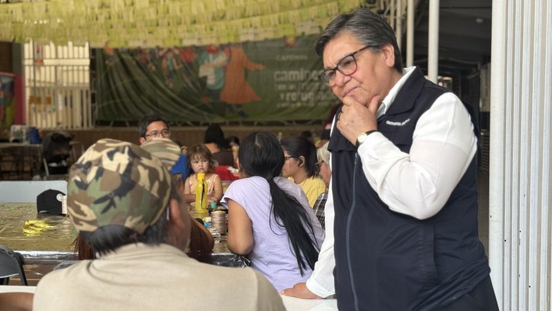 Sister María Magdalena Silva Rentería listens to a man looking for work April 1, 2025, at the CAFEMIN shelter in Mexico City. The shelter, run by the Josephine sisters, is among those scrambling to help migrants who abandoned their journey north to the U.S.-Mexico border and are trying to travel south, back to their country of origin, amid Mexico's restrictions on migrants' movements. (OSV News photo/Rhina Guidos, Global Sisters Report)