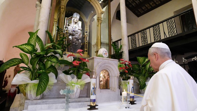 Pope Leo XIV prays before a 13th-century statue of Mary at the Shrine of Our Lady of Grace of Mentorella near Guadagnolo, Italy, Aug. 19, 2025. (CNS photo/Vatican Media)