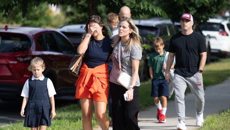 Families and loved reunite following a shooting at Annunciation Catholic School in Minneapolis Aug. 27, 2025. A shooter opened fire with a rifle through the windows of a the school's church and struck children celebrating Mass during the first week of school, killing two and wounding 17 people in an act of violence the police chief called “absolutely incomprehensible.” (OSV News photo/Dave Hrbacek, The Catholic Spirit)