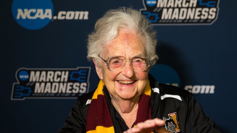 Sister Jean Dolores Schmidt, longtime chaplain of the Loyola University Chicago men's basketball team and campus icon, smiles after the team won in the first round game of the NCAA Tournament against the University of Miami 2018 at the American Airlines Center in Dallas. On Aug. 21, 2025, Sister Jean celebrated her 106th birthday. (OSV News photo/courtesy Loyola University Chicago)