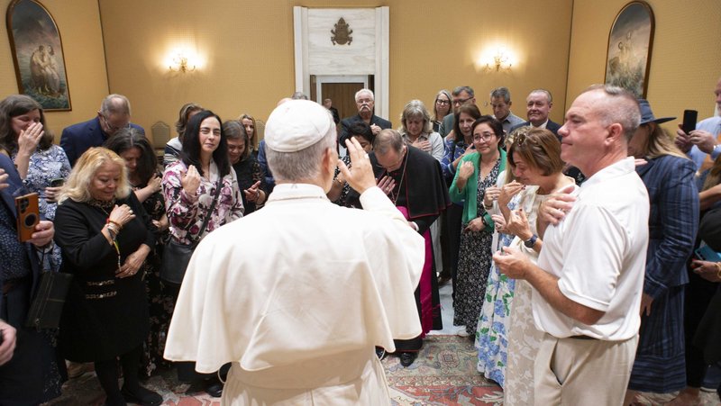 Pope Leo XIV gives his blessing to members of a pilgrimage organized by the U.S. bishops’ Committee for Evangelization and Catechesis for the Jubilee of Catechists at the Vatican on Sept. 27. Sister Rosalía Meza is above the pope’s left shoulder. (CNS/Vatican Media)
