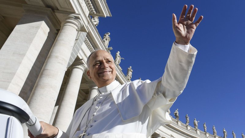 Pope Leo XIV greets pilgrims as he rides the popemobile around St. Peter's Square at the Vatican before an audience for the Jubilee of Migrants and the Jubilee of the Missions Oct. 4, 2025. (CNS photo/Vatican Media)