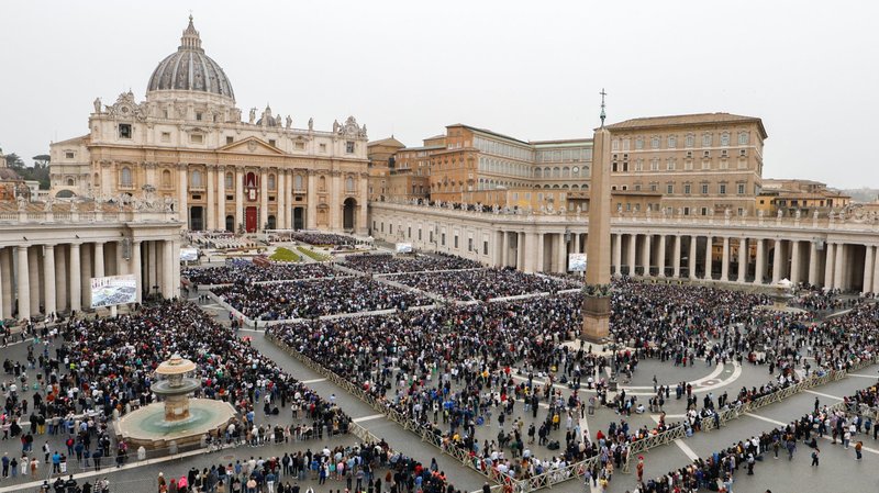 A file photo shows people gathering in St. Peter's Square. (CNS photo/Lola Gomez)