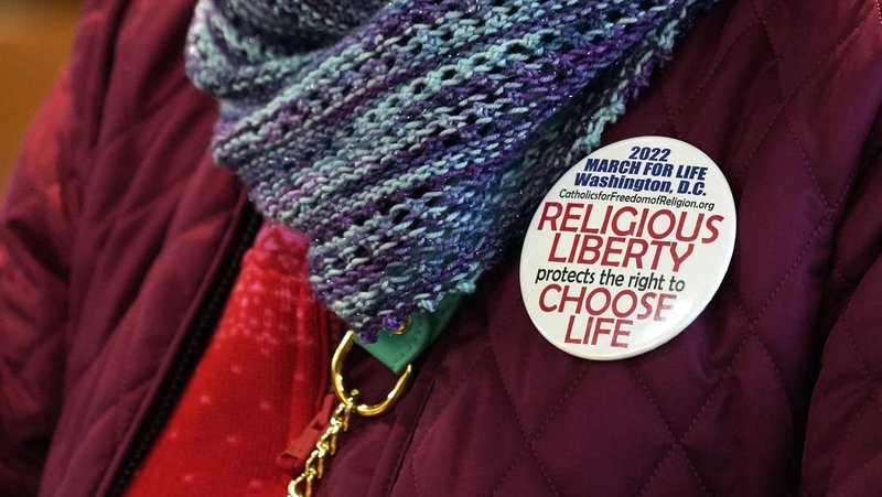 A woman prays during a Religious Freedom Day observance Jan. 16, 2022, at St. Thérèse of Lisieux Church in Montauk, N.Y. (CNS photo/Gregory A. Shemitz)