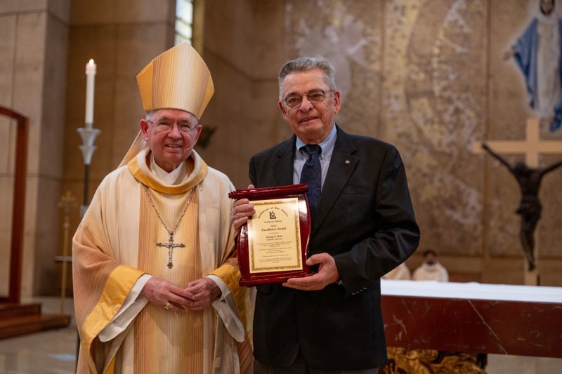 Archbishop José H. Gomez poses with George West, who received the Healthcare Ministry Excellence Award during the Healthcare Professionals Mass, known as the White Mass, at the Cathedral of Our Lady of the Angels on Oct. 12. (Lizzie Friedrich)
