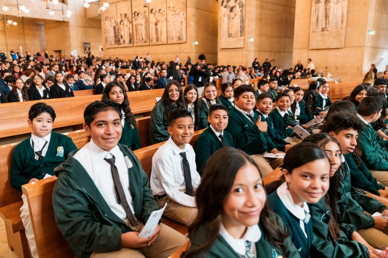 Students from Resurrection School in Boyle Heights smile during the annual Missionary Childhood Association (MCA) Youth Appreciation Mass at the Cathedral of Our Lady of the Angels on Oct. 15. (Isabel Cacho)