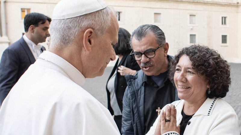 Rosa Bonilla, right, and her husband, Carlos, meet Pope Leo XIV during a private audience with the National Catholic Council for Hispanic Ministry. (Vatican Media)