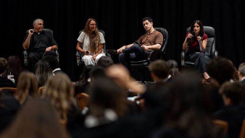 A panel of speakers took questions from high-schoolers at Christian Service 4LIFE at the Cathedral of Our Lady of the Angels conference center Oct. 28. From left: Father Ed Benioff, pastor of Good Shepherd Church in Beverly Hills; Amy D’Ambra; David Henrie; and Lila Rose. (Peter Lobato)