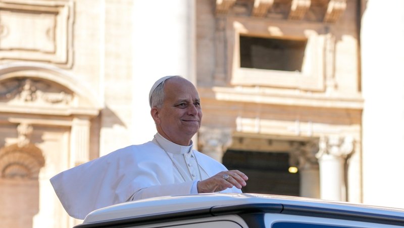 Pope Leo XIV greets visitors and pilgrims from the popemobile as he rides around St. Peter's Square at the Vatican before his weekly general audience Nov. 5, 2025. (CNS photo/Lola Gomez)