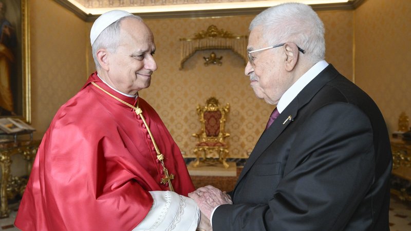 Pope Leo XIV welcomes Palestinian President Mahmoud Abbas to a meeting in the Apostolic Palace at the Vatican Nov. 6, 2025. (CNS photo/Vatican Media)