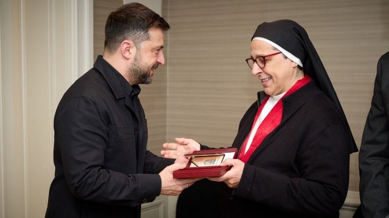 Ukrainian President Volodymyr Zelenskyy awards Argentine Dominican Sister María Lucía Caram Padilla the Order of Princess Olga, III class, in Madrid Nov. 18, 2025. Sister Lucía was honored for her efforts to provide humanitarian aid and support since the beginning of the Russian invasion of Ukraine. (OSV News/courtesy Office of the President of Ukraine)