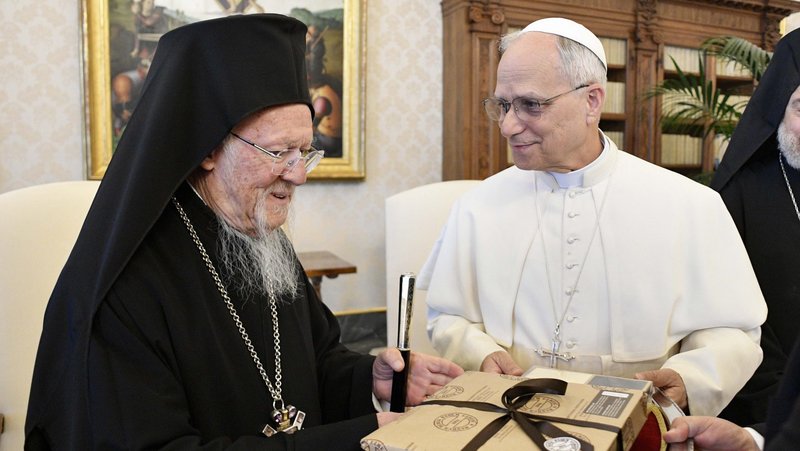 Pope Leo XIV meets with Orthodox Ecumenical Patriarch Bartholomew of Constantinople in the library of the Apostolic Palace at the Vatican May 30, 2025. The patriarch will host Pope Leo at several prayer services and meetings in Istanbul Nov. 28-30. (CNS photo/Vatican Media)