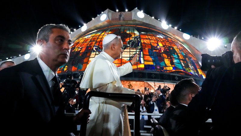 Pope Leo XIV greets the crowd from a mini popemobile during an event with Lebanese young people in the square in front of the Maronite Patriarchate of Antioch in Bkerké, Lebanon, Dec. 1, 2025. (CNS photo/Lola Gomez)