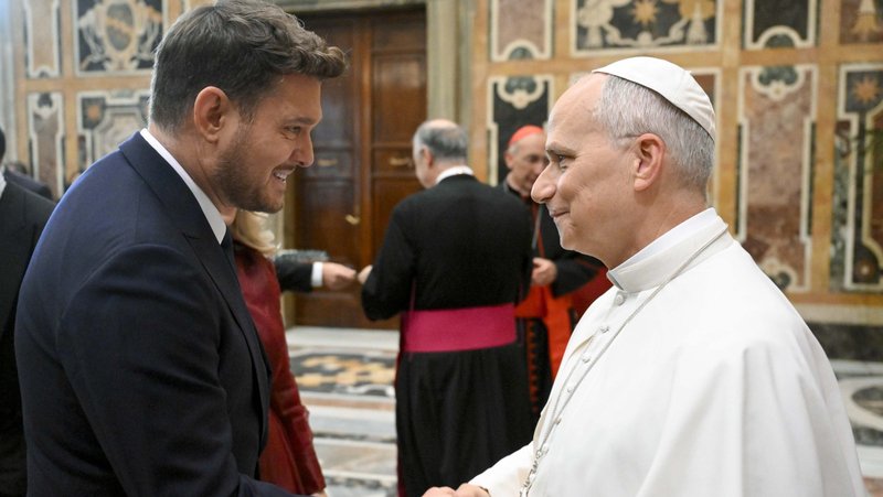 Pope Leo XIV greets Canadian singer Michael Bublé after an audience Dec. 5, 2025, in the Apostolic Palace with the performers and organizers of the Vatican Christmas concert for the poor. (CNS/Vatican Media)